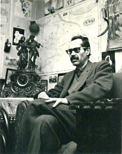 Saenz seated in his writing room, map of La Paz behind him.