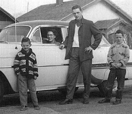 Bowering at 19 with his mother, Pearl, and his two younger brothers, Jim and Roger. Photo: Sally Brown. Permission: Sally Brown.